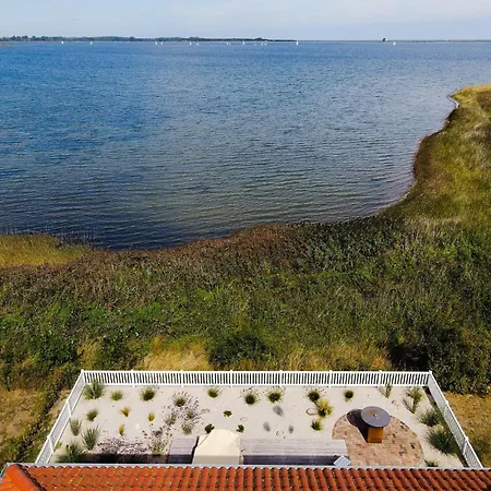 Ferienhaus-sliminde-by-seeblick-ferien-direkte-wasserlage-e-ladesaeule-sauna Feriehus Olpenæs