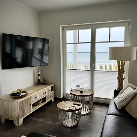 Ferienhaus-sliminde-by-seeblick-ferien-direkte-wasserlage-e-ladesaeule-sauna Feriehus