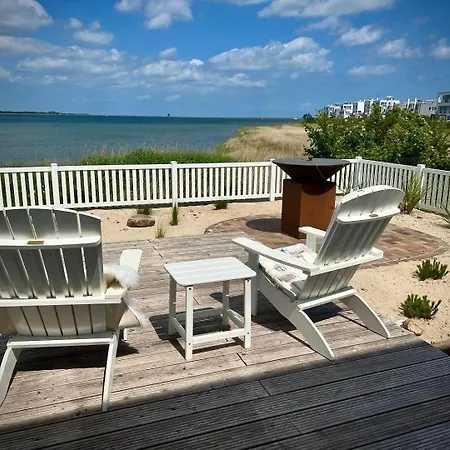 Ferienhaus-sliminde-by-seeblick-ferien-direkte-wasserlage-e-ladesaeule-sauna Olpenæs