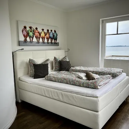 Ferienhaus-sliminde-by-seeblick-ferien-direkte-wasserlage-e-ladesaeule-sauna Feriehus *