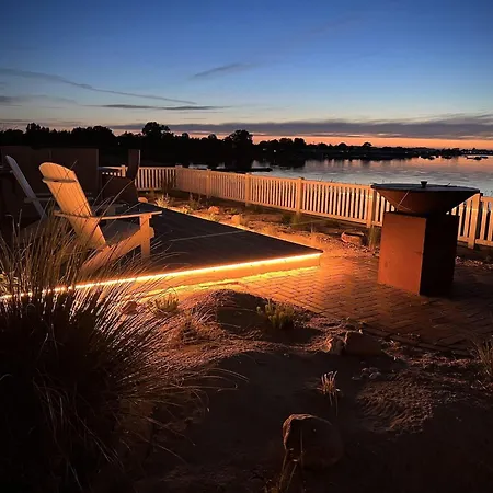 Ferienhaus-sliminde-by-seeblick-ferien-direkte-wasserlage-e-ladesaeule-sauna * Olpenæs