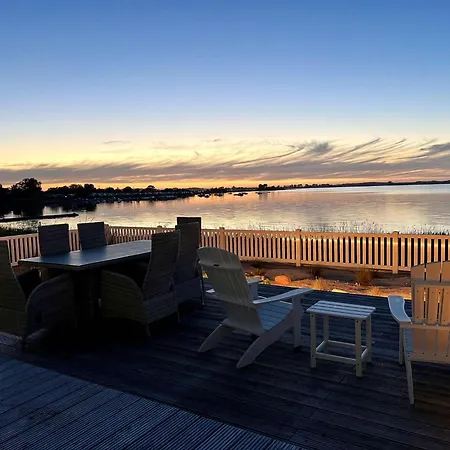 Ferienhaus-sliminde-by-seeblick-ferien-direkte-wasserlage-e-ladesaeule-sauna Olpenæs