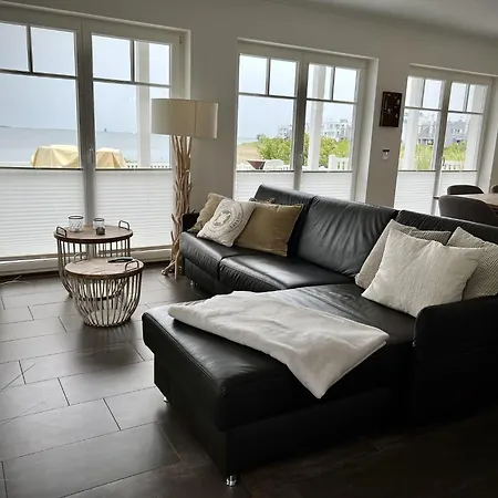 Ferienhaus-sliminde-by-seeblick-ferien-direkte-wasserlage-e-ladesaeule-sauna *