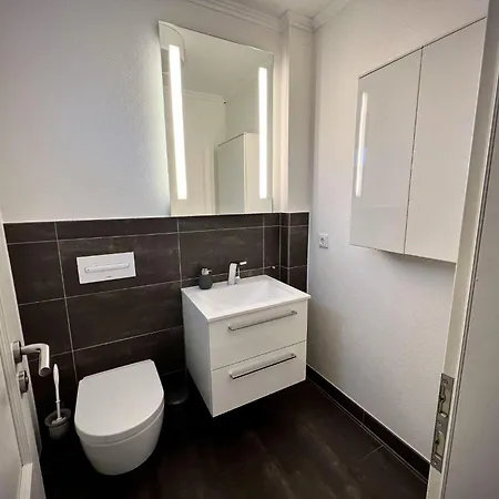 Ferienhaus-sliminde-by-seeblick-ferien-direkte-wasserlage-e-ladesaeule-sauna * Olpenæs