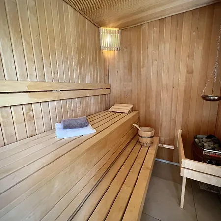 Ferienhaus-sliminde-by-seeblick-ferien-direkte-wasserlage-e-ladesaeule-sauna Feriehus Olpenæs