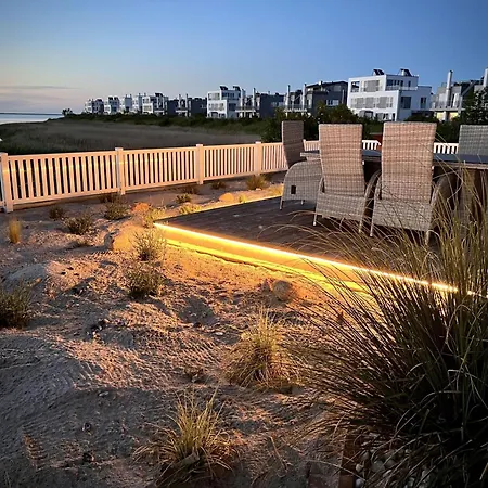 Ferienhaus-sliminde-by-seeblick-ferien-direkte-wasserlage-e-ladesaeule-sauna *