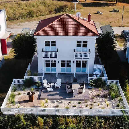 Ferienhaus-sliminde-by-seeblick-ferien-direkte-wasserlage-e-ladesaeule-sauna *