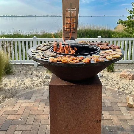 Ferienhaus-sliminde-by-seeblick-ferien-direkte-wasserlage-e-ladesaeule-sauna * Olpenæs