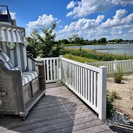 Ferienhaus-sliminde-by-seeblick-ferien-direkte-wasserlage-e-ladesaeule-sauna * Olpenæs
