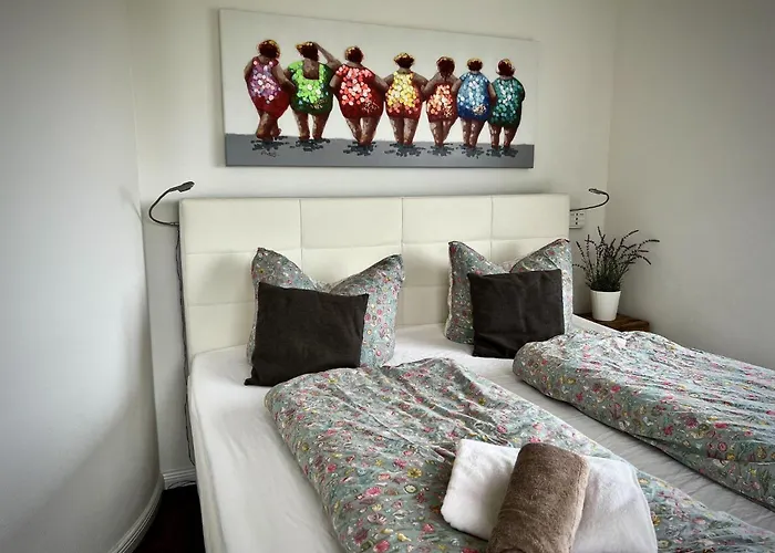 Ferienhaus-sliminde-by-seeblick-ferien-direkte-wasserlage-e-ladesaeule-sauna *